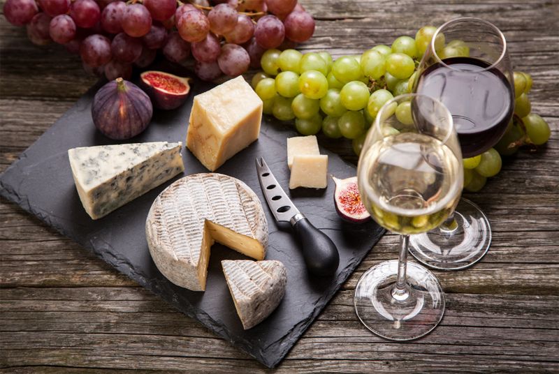 Wine with cheese and grapes